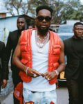 15th-Headies-2022-Patoranking-Orange-Padded-Vest.jpg